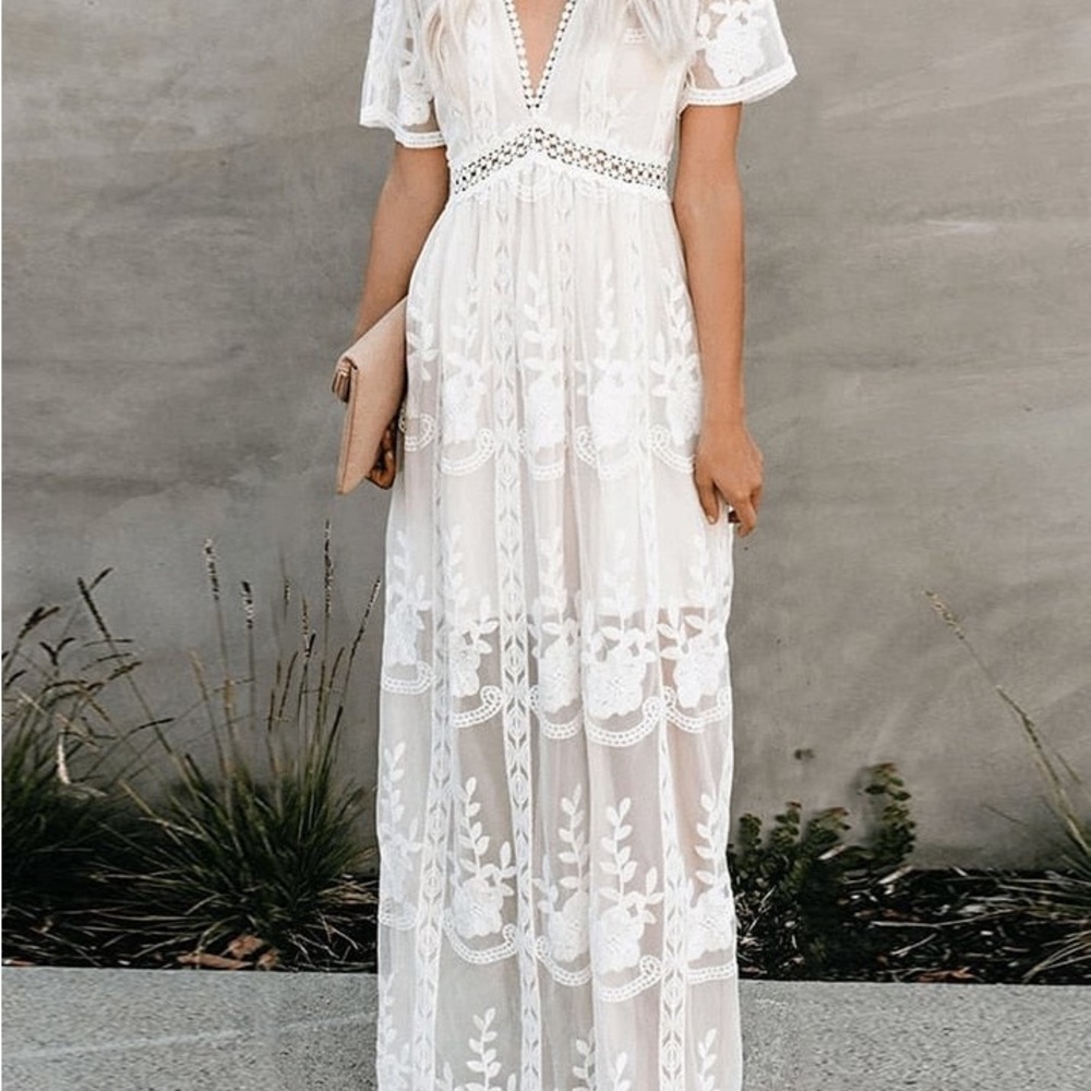 NWOT. Lace and semi-transparent tulle in a long white bohemian dress.